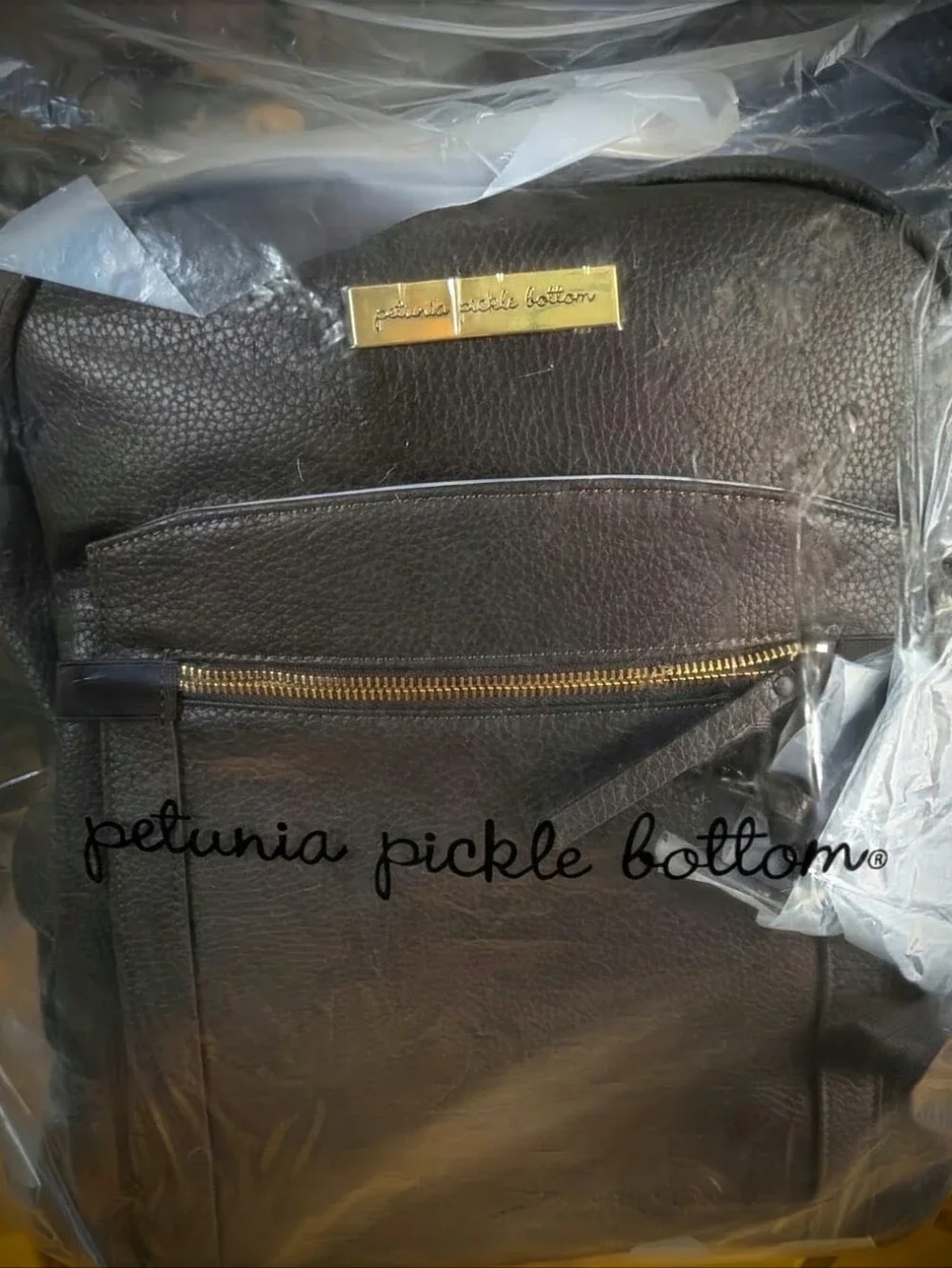 Petunia Pickle Bottom Brown Leatherette Backpack Diaper Bag.